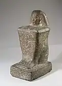 Block statue of the god's father Pameniuwedja, son of Nesmin and Nestefnut; 4th century BC; height: 34.6 cm (13.6 in), width: 14.5 cm (5.7 in), depth: 19.1 cm (7.5 in); Metropolitan Museum of Art