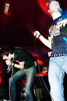 The Blood Brothers performing live, c2003