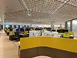 An office space, highlighting the aluminium ceiling "petals"