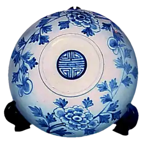 Rice bowl cover decorated with a medallion of the double happiness and longevity (Shou) symbol in the center, from Joseon Dynasty Korea