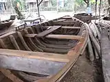 Boat nearing completion with frames added, Hội An