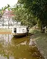 Replica of boat used by Rabindranath Tagore, reserved at the pond of Shelaidaha Kuthibari. (2016)