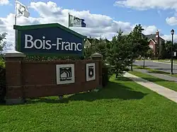 An entrance of the Bois-Franc neighbourhood on Alexis Nihon Boulevard.