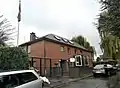 Afghan flag hanging over the Afghan Embassy in Bonn, Germany