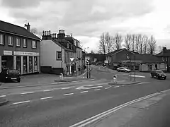  a black and white image of Bonnybridge town centre