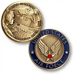 The challenge coin for a boom operator.