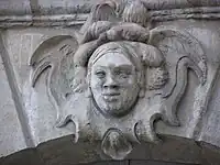 African face mascaron on the place de la Bourse