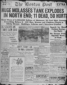 The front page of an old newspaper. The headline reads, "HUGE MOLASSES TANK EXPLODES IN NORTH END; 11 DEAD, 50 HURT".