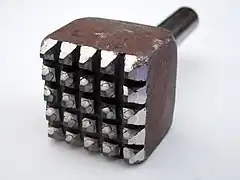A bush hammer chisel for pneumatic hammers