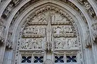 The portal of Saint Guillaume depicts the spire of the cathedral, since disappeared