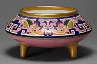 Oriental bowl, 1871, Christopher Dresser, with motifs from ancient Chinese ritual bronzes, in a "cloisonné ware" style.