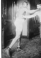 The large glutes and muscular proportions of this heavyweight boxer demonstrate the 20th Century revival of historical training focuses