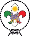 The emblem of the Boy Scouts of Iraqi Kurdistan incorporates a lamassu, an Assyrian protective deity, often depicted as having a human's head, a body of an ox or a lion, and bird's wings.