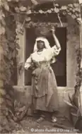 Italian woman with a basket on her head (before 1872)