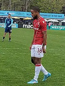 Player on the pitch during a break in the match