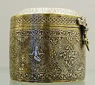 Room 34 - Cylindrical lidded box with an Arabic inscription recording its manufacture for the ruler of Mosul, Badr al-Din Lu'lu', Iraq, c. 1233-1259 AD