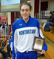 Breanna Stewart holding a plague in her left hand in 2012