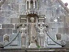 The depiction of Saint Aurelian with two caryatids on the ossuary gable