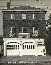 Facade of a three-story brick fire station