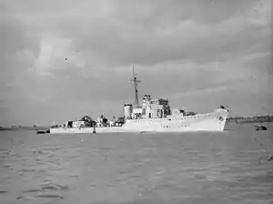 Black and white photograph showing a Royal Navy Type I Hunt-class destroyer at sea