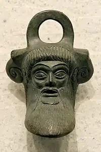 Ancient Greek mascaron from a situla, late 6th century BC, bronze, Louvre