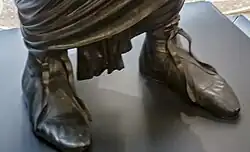 Patrician calceus on the feet of the Emperor Tiberius (c. 37)