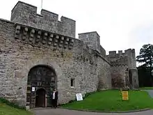 Curtain Walls, Gateway Buildings, Stables, and Domestic Ranges Forming Part of Brougham Hall