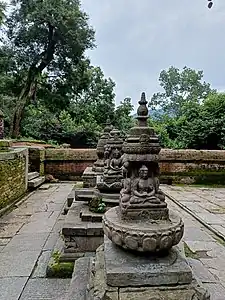 Buddha statue behind Bajrayogini temple