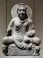 The Buddha on lion throne. Takht-i-Bahi. Schist, H. 525 mm (20.7 in). Museum für Indische Kunst.