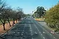 Cars on Avenida Figueroa Alcorta during noon.