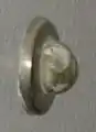 A doorknob-blocking wall mounted doorstop, also called a "wall bumper"