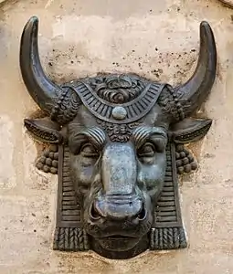 Bronze bull's head, a spout of the meat market fountain of Paris's marché des Blanc-Manteaux,  by sculptor Edme Gaulle  (1819)