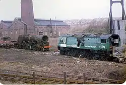 35009 Shaw Savill (left) with Battle of Britain class 34073 249 Squadron (right) at Woodham's Scrapyard, Barry in 1984