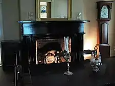The fireplace mantle in the room where Theodore Roosevelt Sr. and Mittie Bulloch were married.