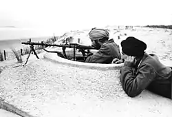 Sikh soldiers of the Indian Legion guarding the Atlantic Wall in France in March 1944. Subhas Chandra Bose initiated the legion's formation as a military force fighting alongside the Axis powers.