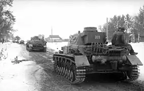 Panzer IV tank with an N.K.A.V. mounted above the muffler.