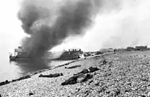 Operation Jubilee destroyed Landing craft on fire with Canadian dead on the beach