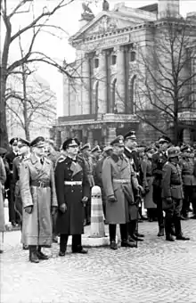 German officers stand in front of the National Theater in Oslo, 1940.