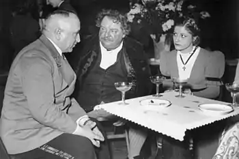 After a performance of Schiller's Intrigue and Love at the Théâtre des Champs-Élysées in 1941, from left to right: Dr. Ley, Reich organization leader; Heinrich George, Schiller Theater Intendant; and German actress Gisela Uhlen (Bundesarchiv)