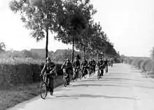 SS troops advancing on bicycles in 1944