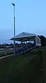 Temporary covered seating stand