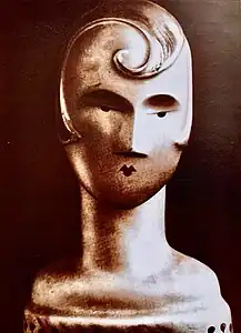 Primitivist influences - Bust for a shop window, anonymous Belgian artist, c.1920, painted papier-mâché, private collection, Cologne. Like in the case of many Art Deco sculptures, this bust visibly borrows the geometric purity of Constantin Brâncuși's works, like the Sleeping Muse, but a few more details were added