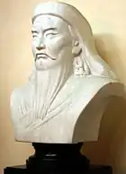Bust of man with long beard.