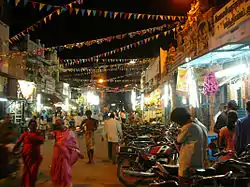 image of a street with shops in twilight