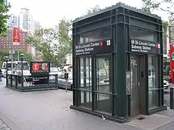 An elevator on the sidewalk outside the 66th Street–Lincoln Center station, leading down to the platform
