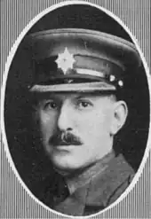 youngish white man, with dark moustache, in British army officer's uniform of the First World War