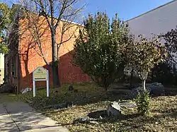 Sign for the CARE Community at the corner of Orleans Street and N. Chester Street in Baltimore