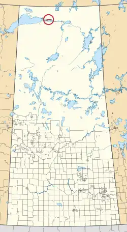 A map of the province of Saskatchewan showing 297 rural municipalities and hundreds of small Indian reserves. One is highlighted with a red circle.