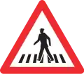 1.22 Pedestrian crossing ahead (below 200 m ahead; only on non-urban roads in case of bad visibility; often panel 5.01 is added)