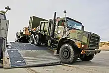 Designation for extended cargo 5.486 m wheelbase MTVRs is MK27 or MK28 (with winch)